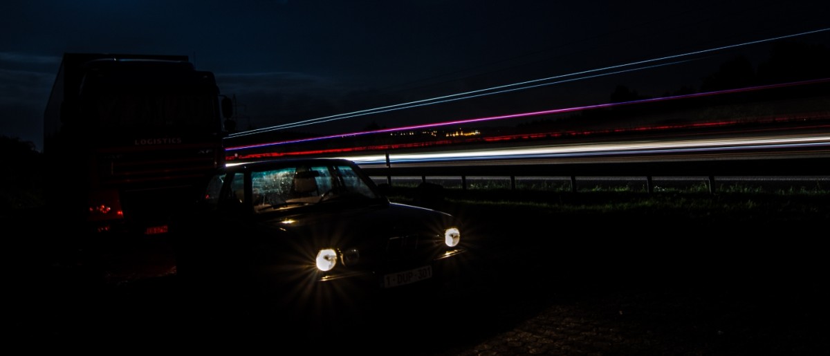 BMW E28 518i by night near German motorway